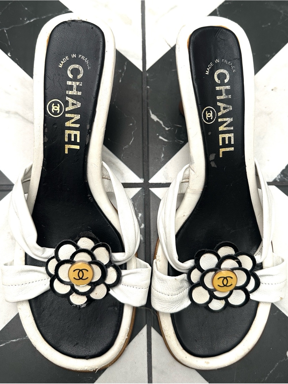 CHANEL White Leather Camellia Slide Sandals with Black Footbed